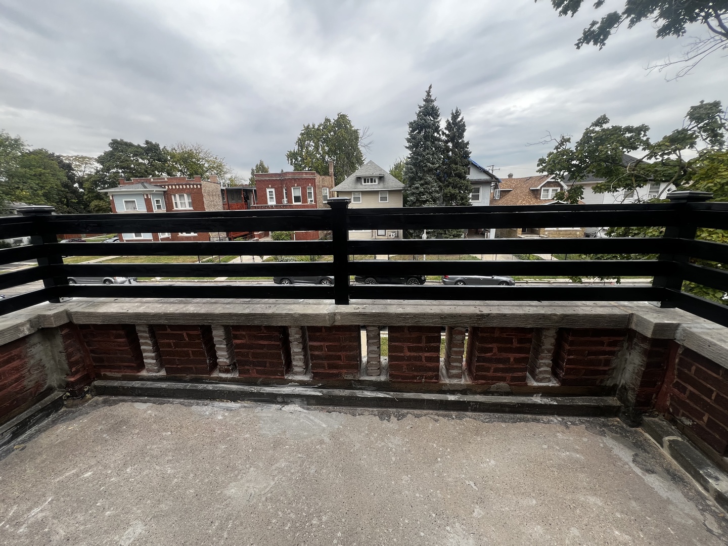 5461 West Haddon Avenue, Unit 2 Chicago, IL 60651 - Photo 19 of 21 a view of a balcony with an outdoor space