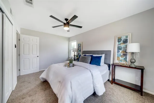 a bathroom with a sink toilet and mirror