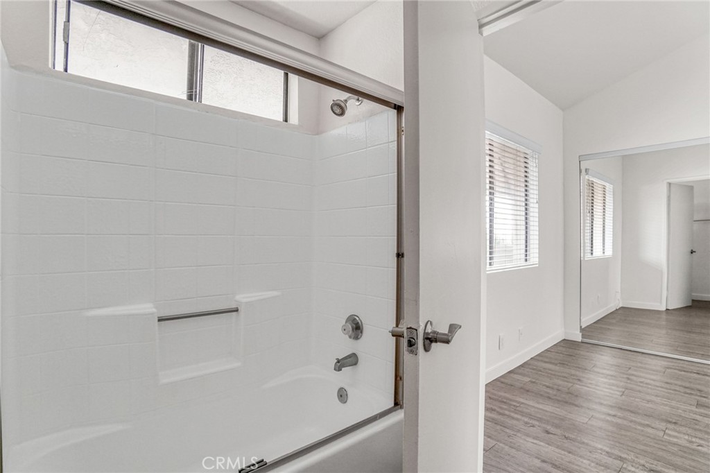 751 Cerritos Avenue Long Beach, CA 90813 - Photo 6 of 15 a bathroom with a bathtub and a shower