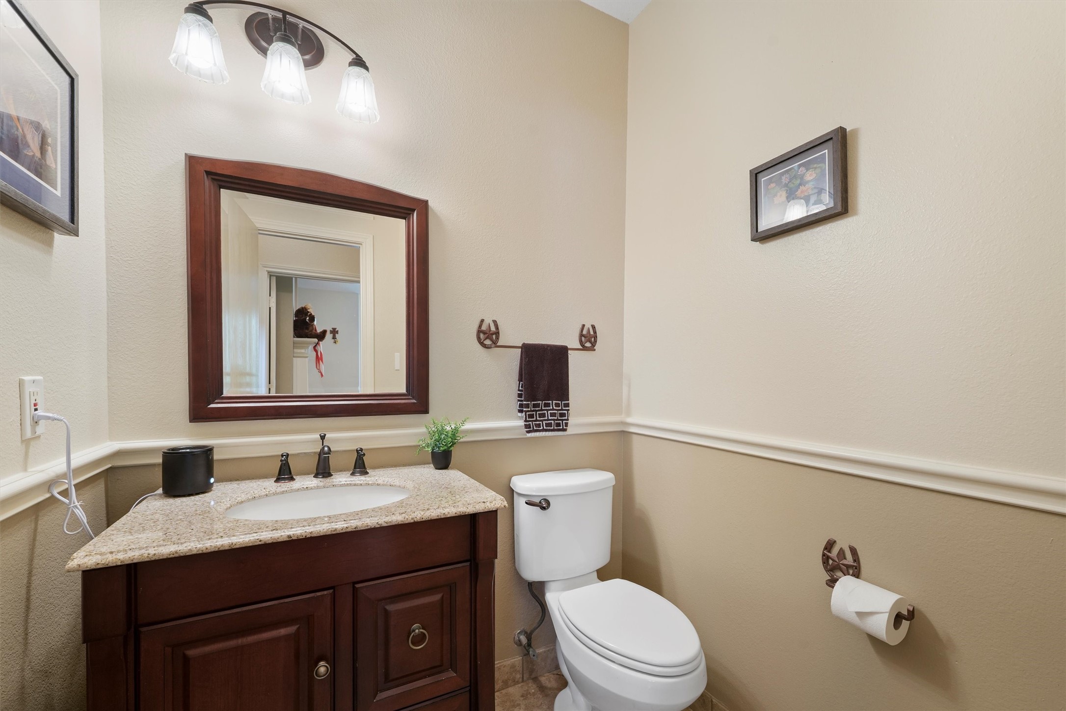 6803 Treaschwig Road Spring, TX 77373 - Photo 10 of 22 a bathroom with a granite countertop sink mirror vanity and toilet