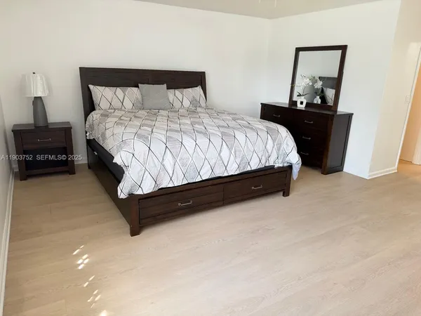 a kitchen with a sink and a stove top oven