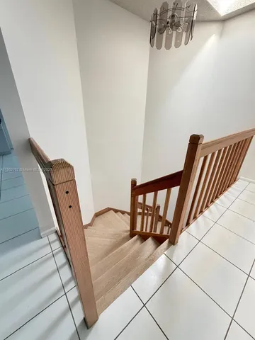 a view of balcony with furniture