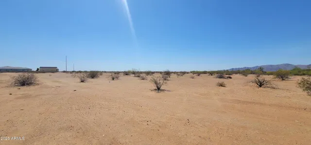 a picture of a bench in front of a building