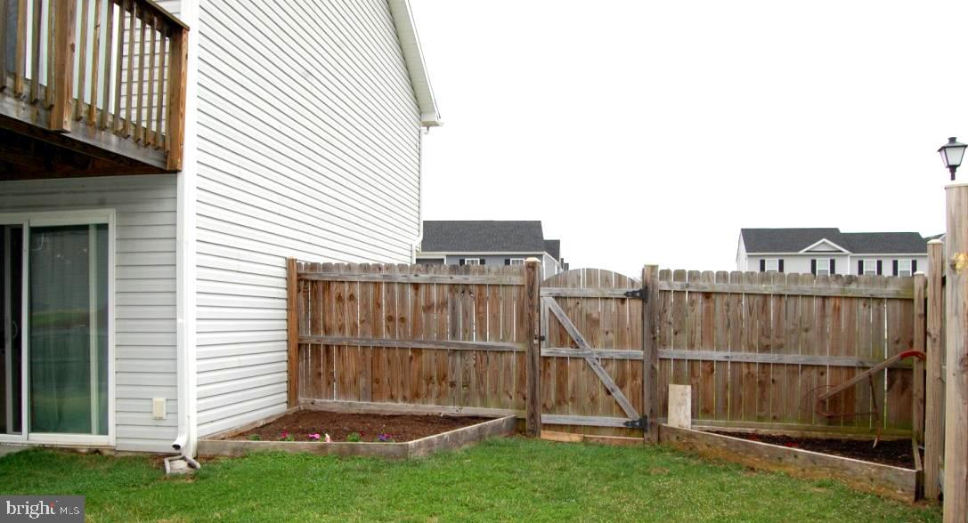 23 Job Inwood, WV 25428 - Photo 23 of 29 Let's walk around the fully fenced backyard....