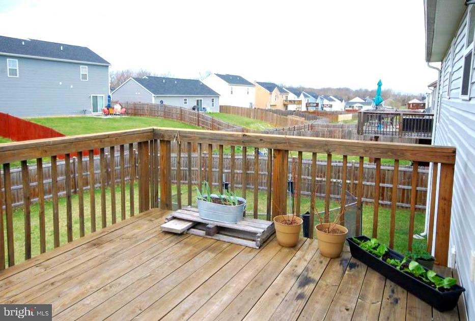 23 Job Inwood, WV 25428 - Photo 9 of 29 The deck overlooks a large fenced-in back yard.