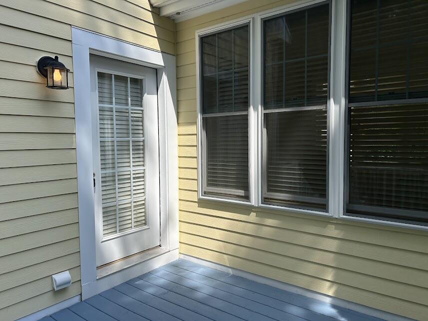 54 Sycamore Lane, Unit 19 Kennebunk, ME 04043 - Photo 30 of 37 Back Door to Kitchen
