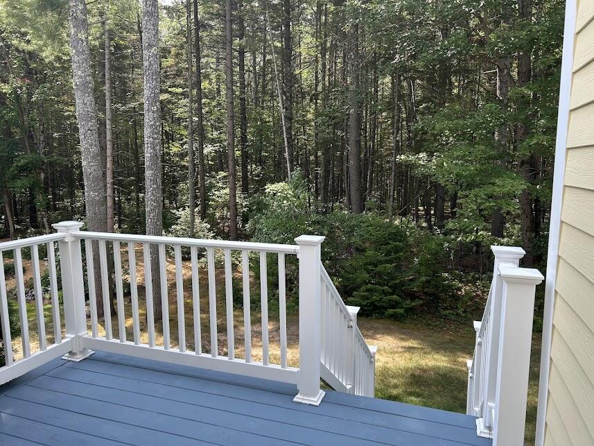 54 Sycamore Lane, Unit 19 Kennebunk, ME 04043 - Photo 31 of 37 Deck Overlooking Conservation Land