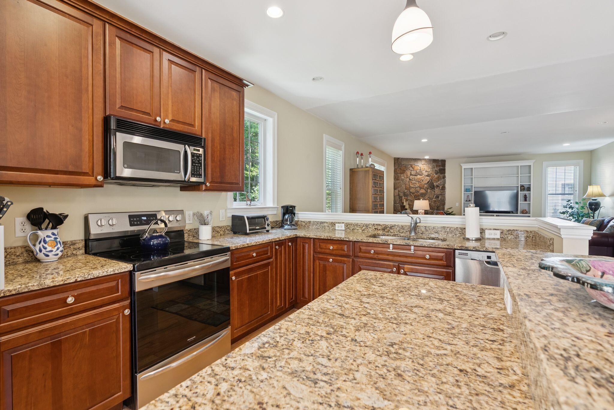 54 Sycamore Lane, Unit 19 Kennebunk, ME 04043 - Photo 7 of 37 View From Island to Dining & Living