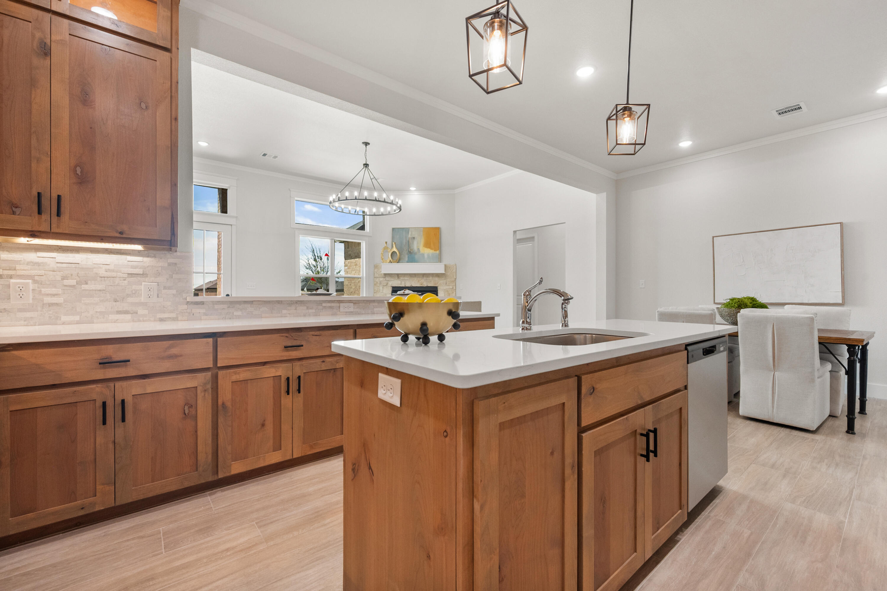 7526 57th Street Lubbock, TX 79407 - Photo 13 of 36 a kitchen with a sink and stove