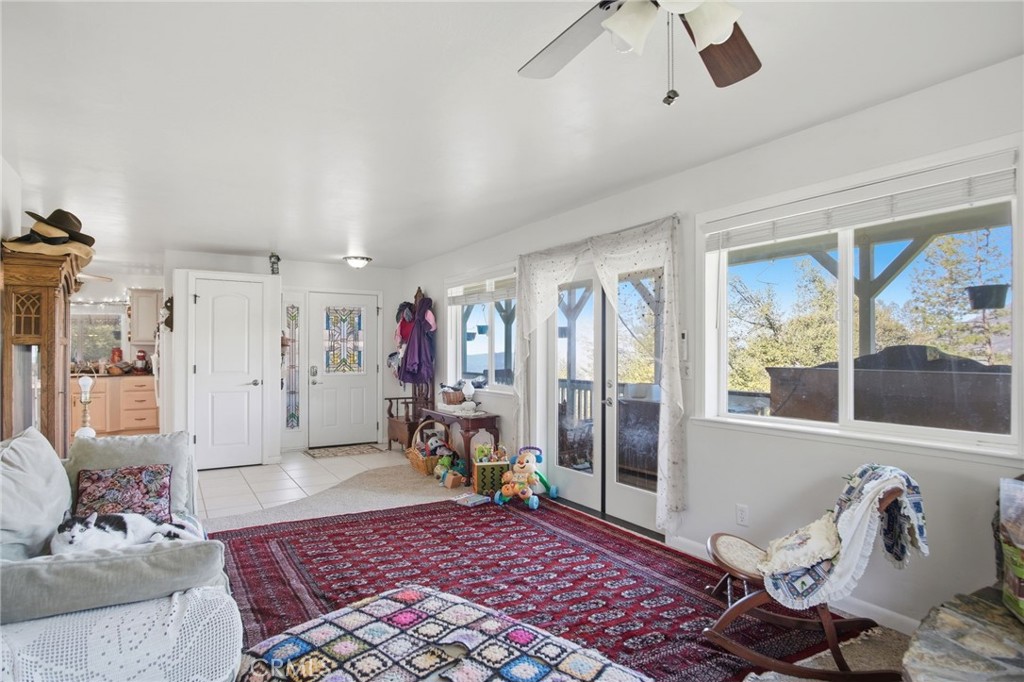 5769 Clouds Rest Mariposa, CA 95338 - Photo 32 of 49 a living room with furniture and a rug