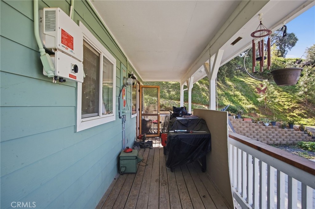 5769 Clouds Rest Mariposa, CA 95338 - Photo 8 of 49 a view of balcony with furniture and wooden floor
