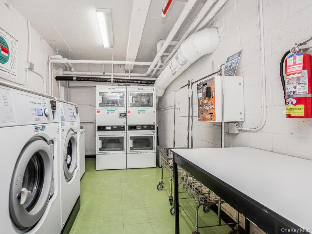 6535 Broadway, Unit 2E Bronx, NY 10471 - Photo 7 of 11 a view of a storage & utility room with washer and dryer