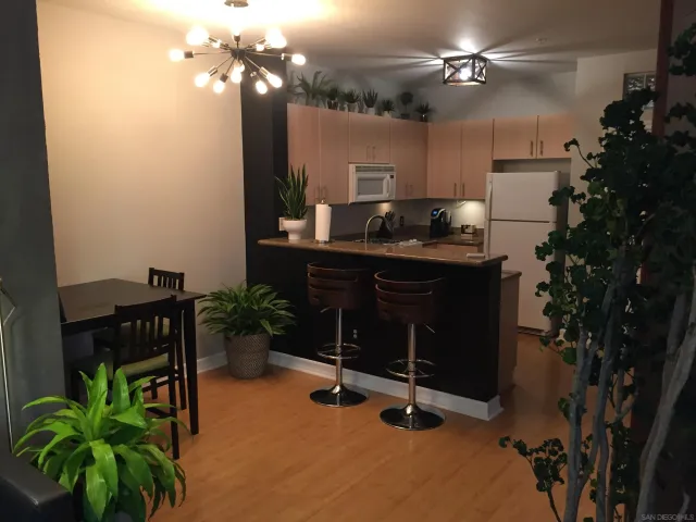 a view of a workspace with furniture