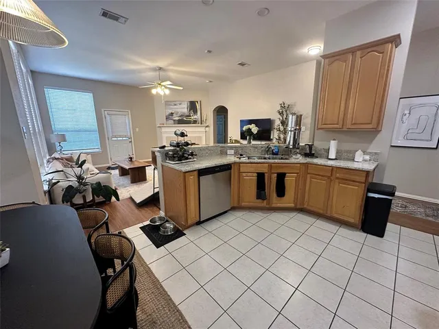 a large bathroom with a sink and a mirror