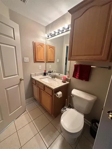 a bathroom with a bath tub with a shower