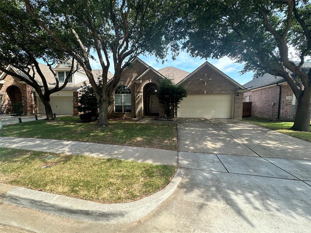 2450 Streamside Court Frisco, TX 75036 - Photo 2 of 28 a view of a house with a yard
