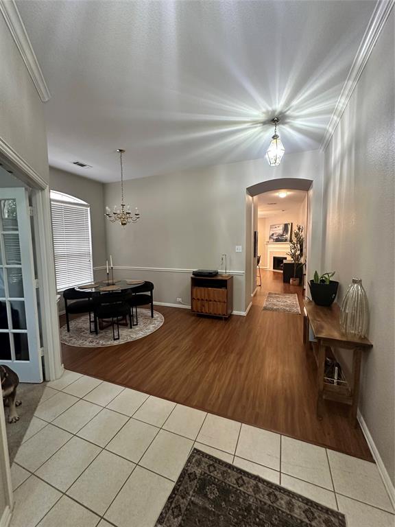 2450 Streamside Court Frisco, TX 75036 - Photo 7 of 28 a living room with furniture and a wooden floor