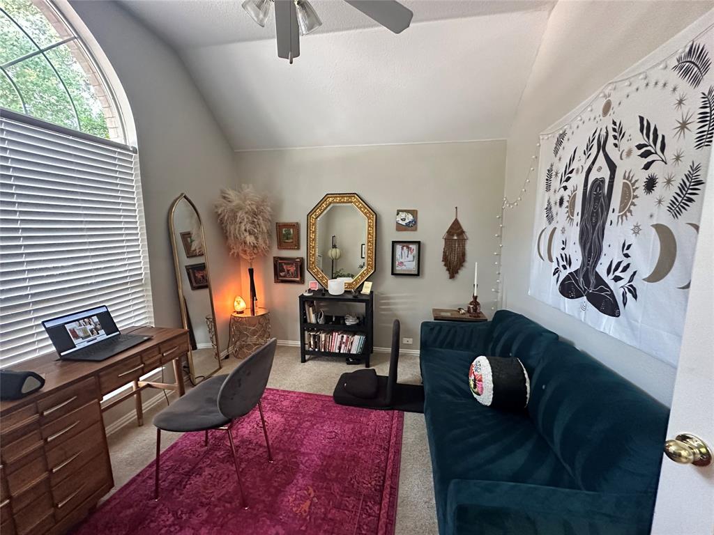 2450 Streamside Court Frisco, TX 75036 - Photo 9 of 28 a living room with furniture a rug and a window