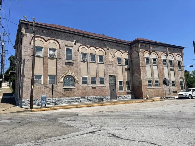 a front view of a building with street