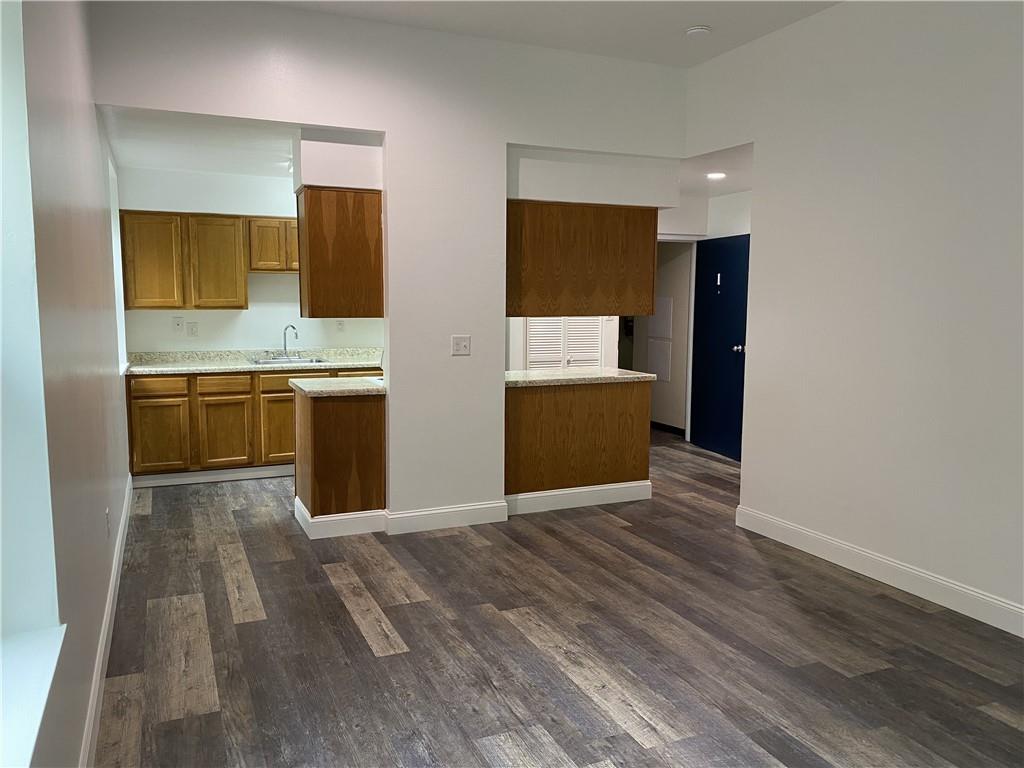 100 2nd Street Braddock, PA 15104 - Photo 18 of 29 a view of kitchen with stainless steel appliances wooden floor and electronic appliances