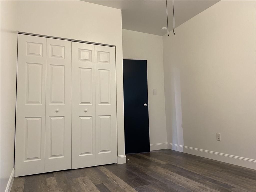 100 2nd Street Braddock, PA 15104 - Photo 23 of 29 an empty room with wooden floor