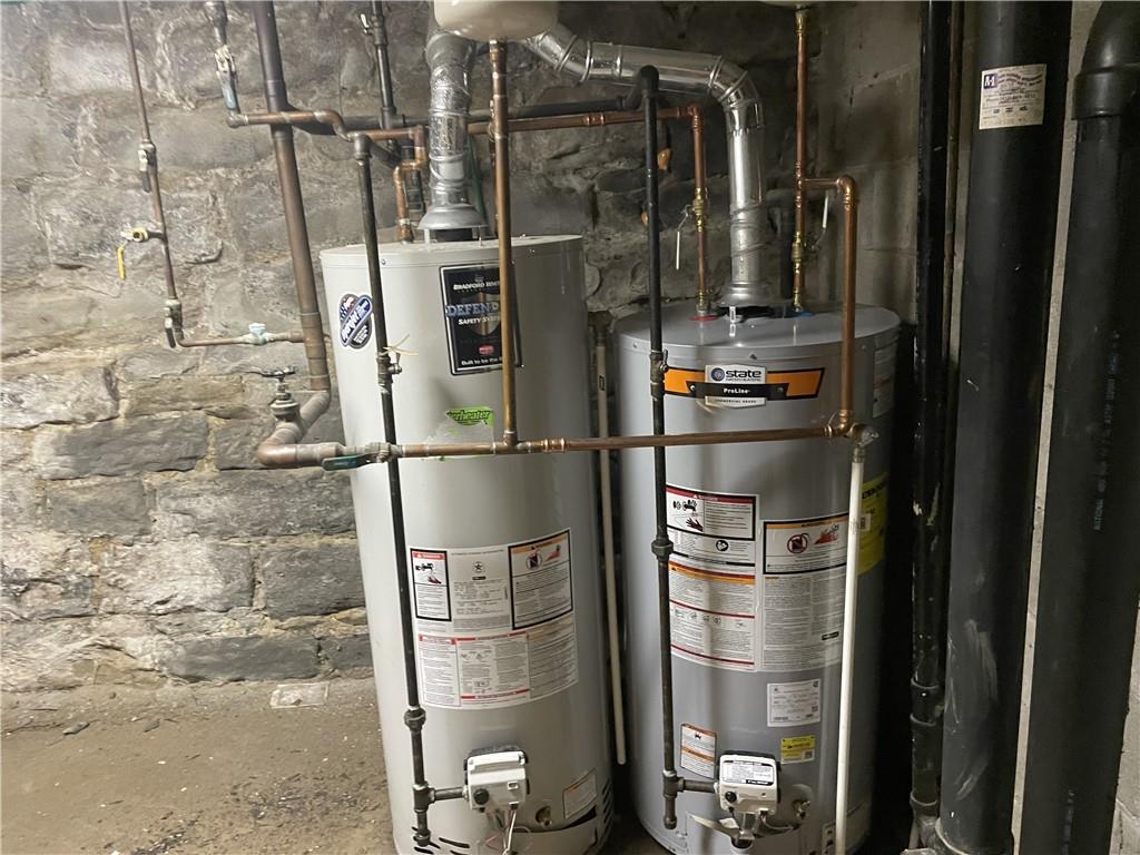 100 2nd Street Braddock, PA 15104 - Photo 29 of 29 a bathroom with a glass shower door