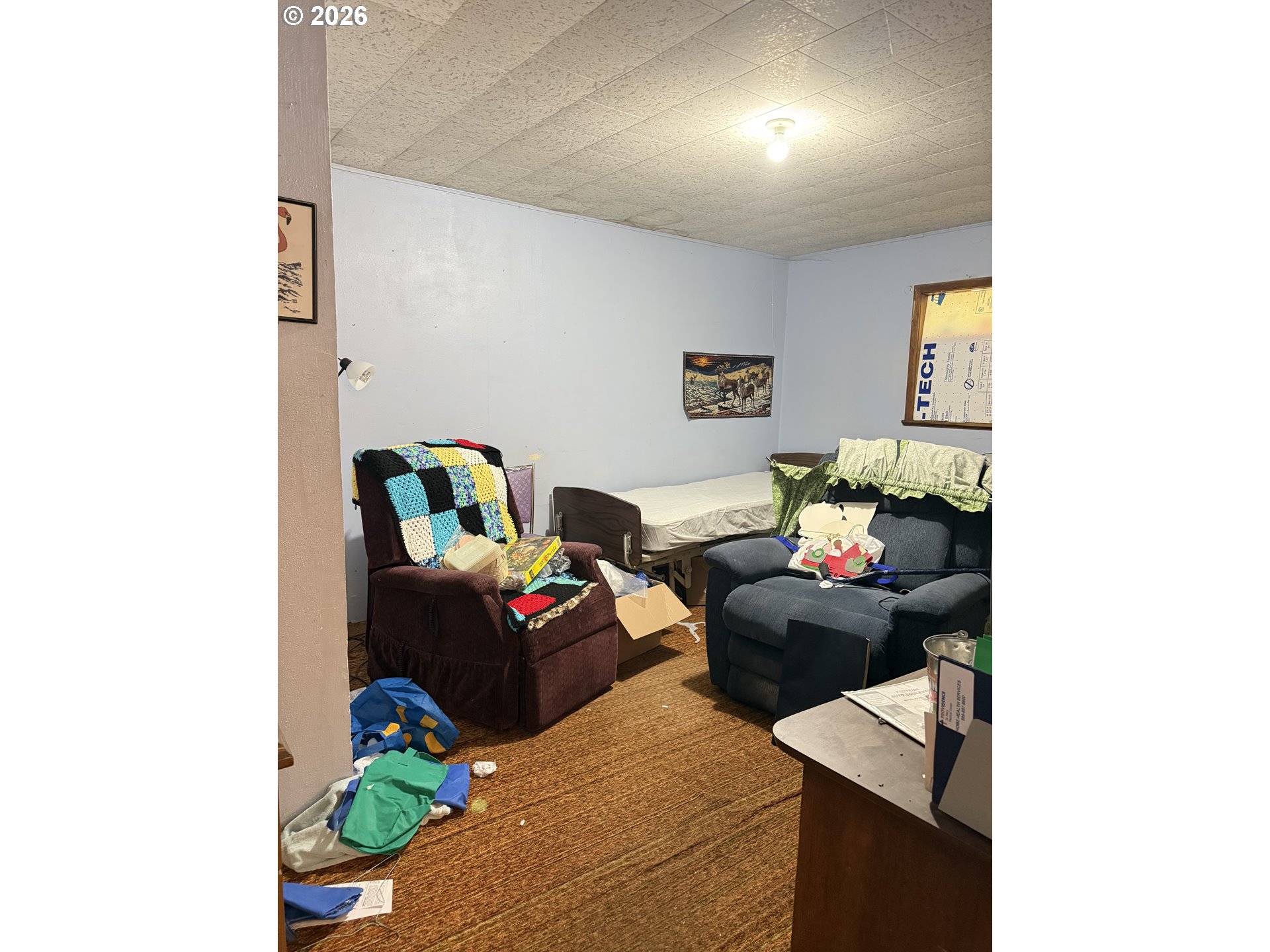 375 College Street Adams, OR 97810 - Photo 17 of 20 a living room with furniture and a wooden floor