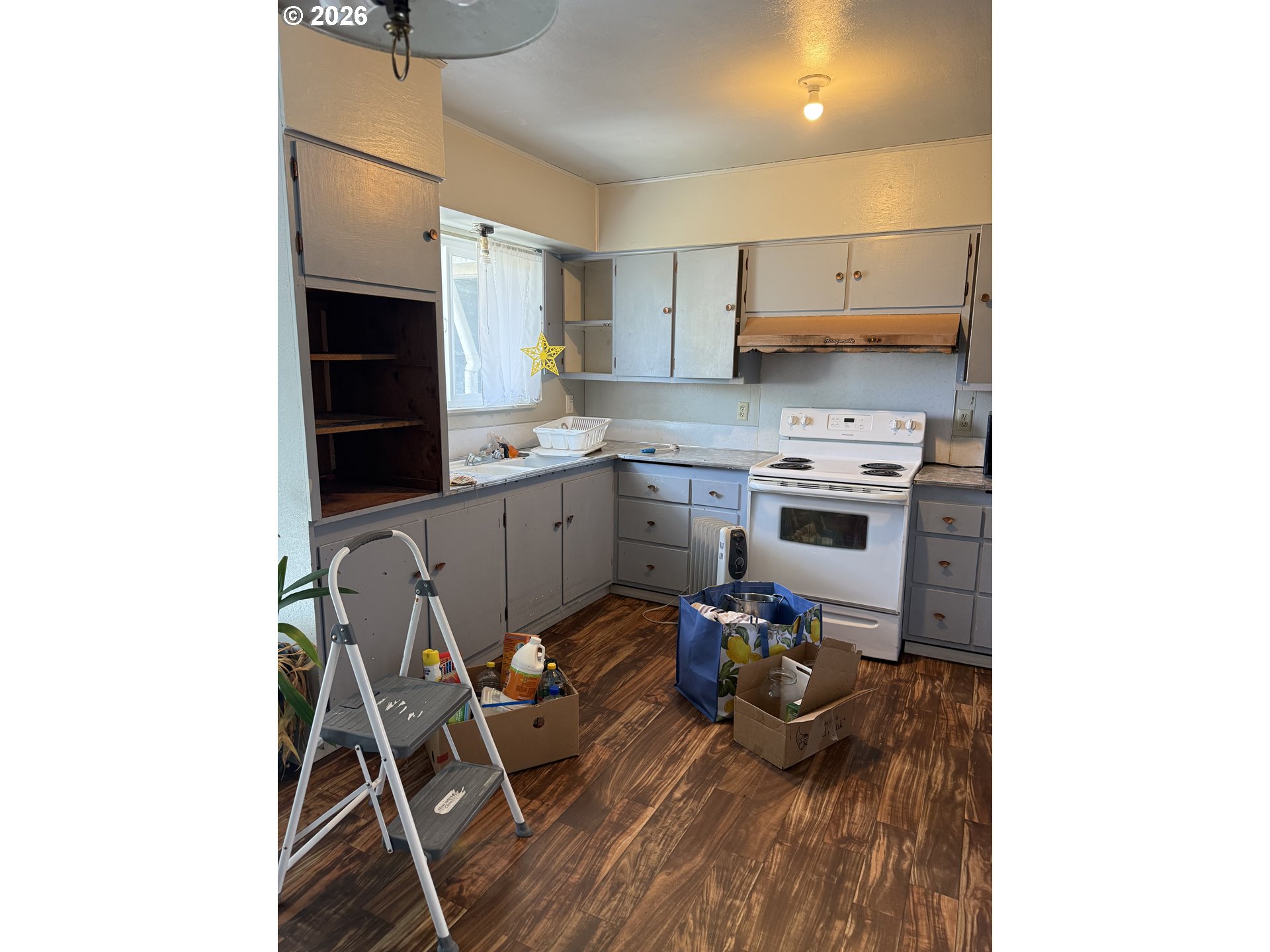 375 College Street Adams, OR 97810 - Photo 2 of 20 a kitchen with a sink appliances and cabinets