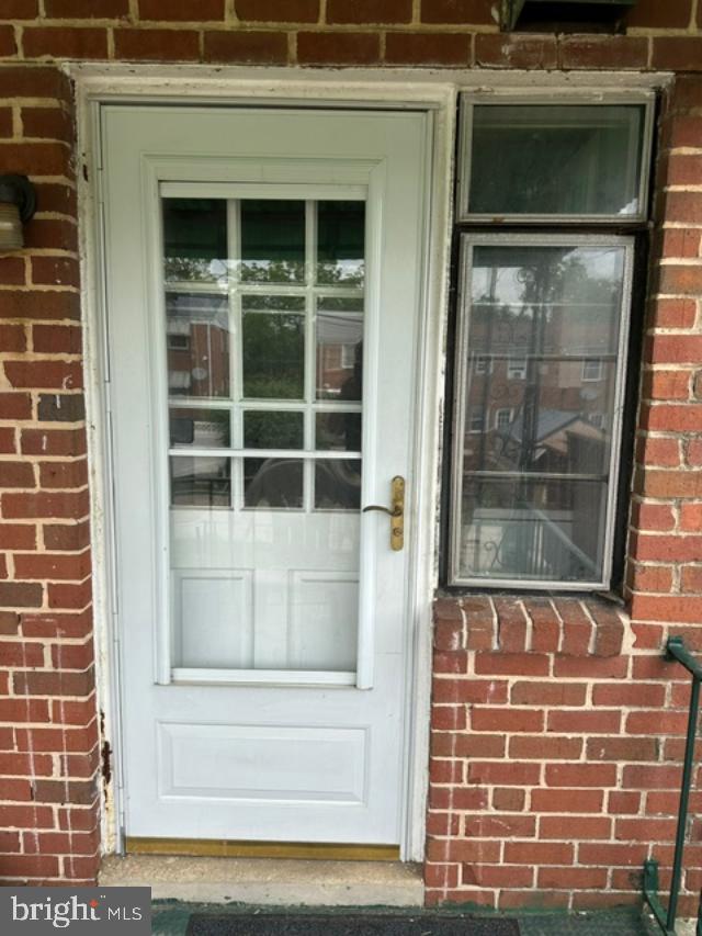 1619 Inverness Avenue Baltimore, MD 21230 - Photo 25 of 30 a view of front door of house with a window
