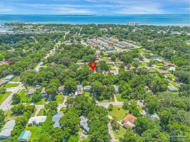 a view of a city with lots of buildings in the background