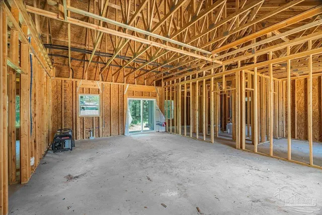 a view of house with a yard