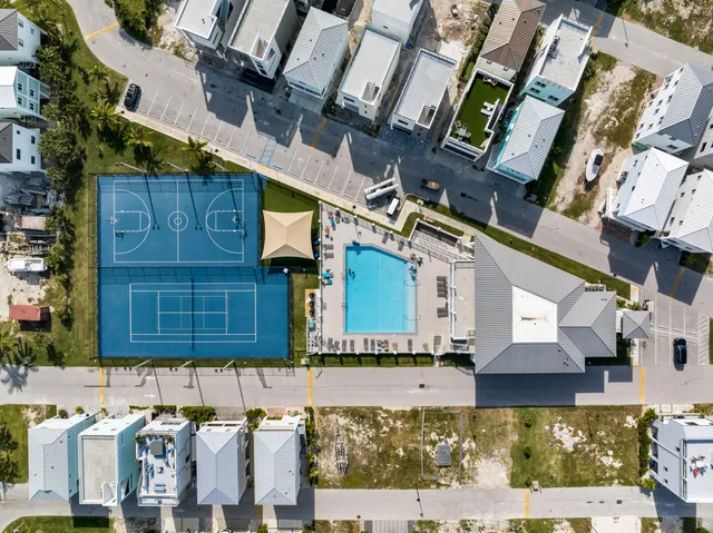 a view of a roof deck with furniture