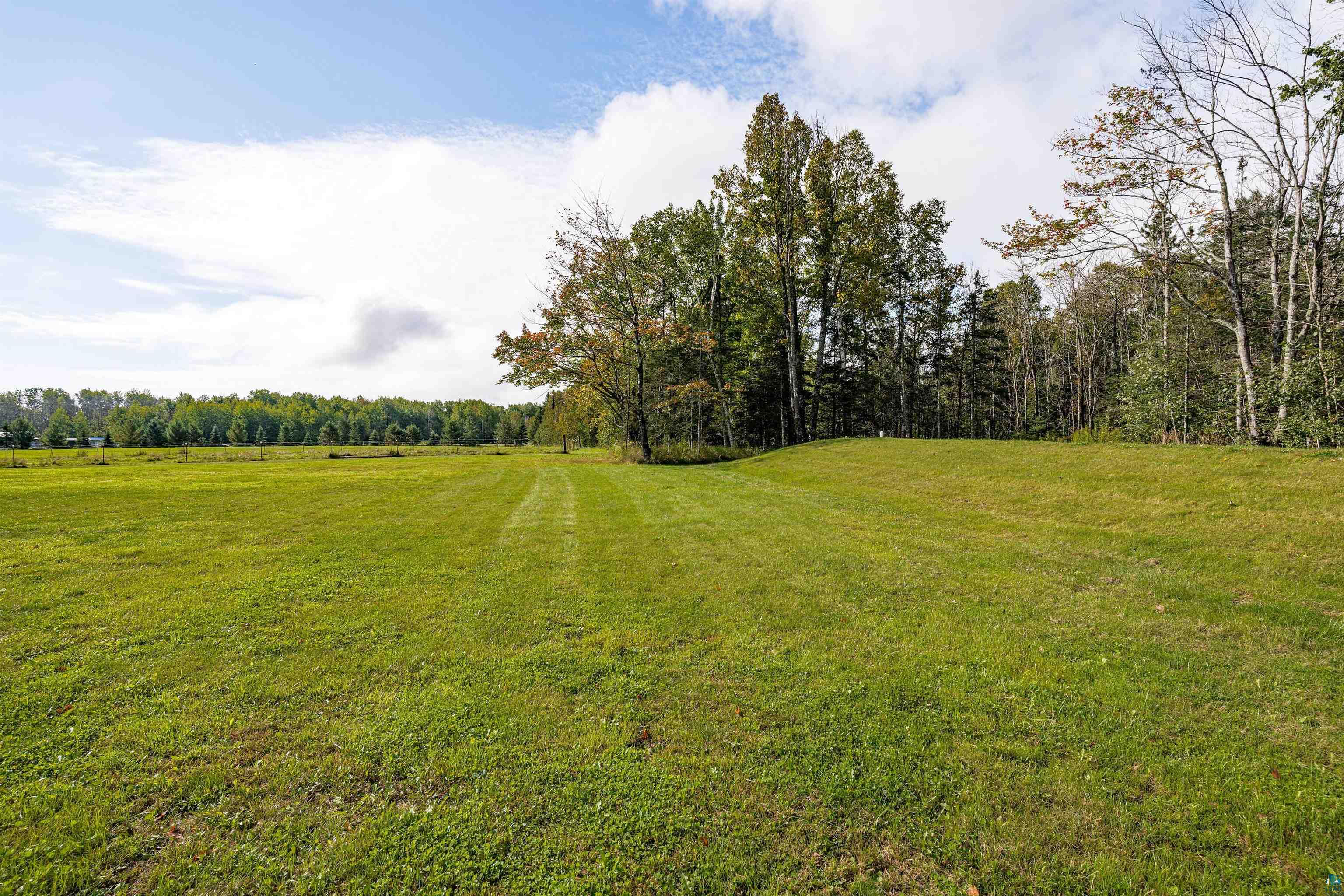 3126 Beyer Road Duluth, MN 55804 - Photo 5 of 23 Expansive green space featuring a large, level lawn