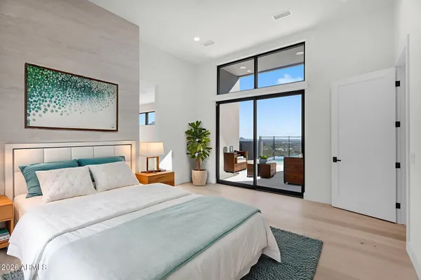 a bathroom with a white wall