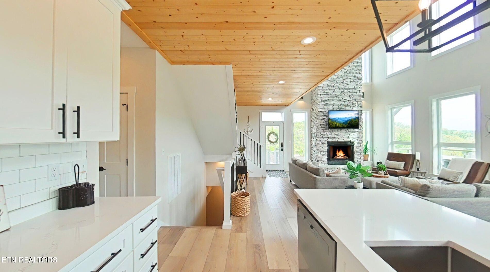 234 Cameron Loop Lane La Follette, TN 37766 - Photo 15 of 60 a large kitchen with sink a counter space and living room