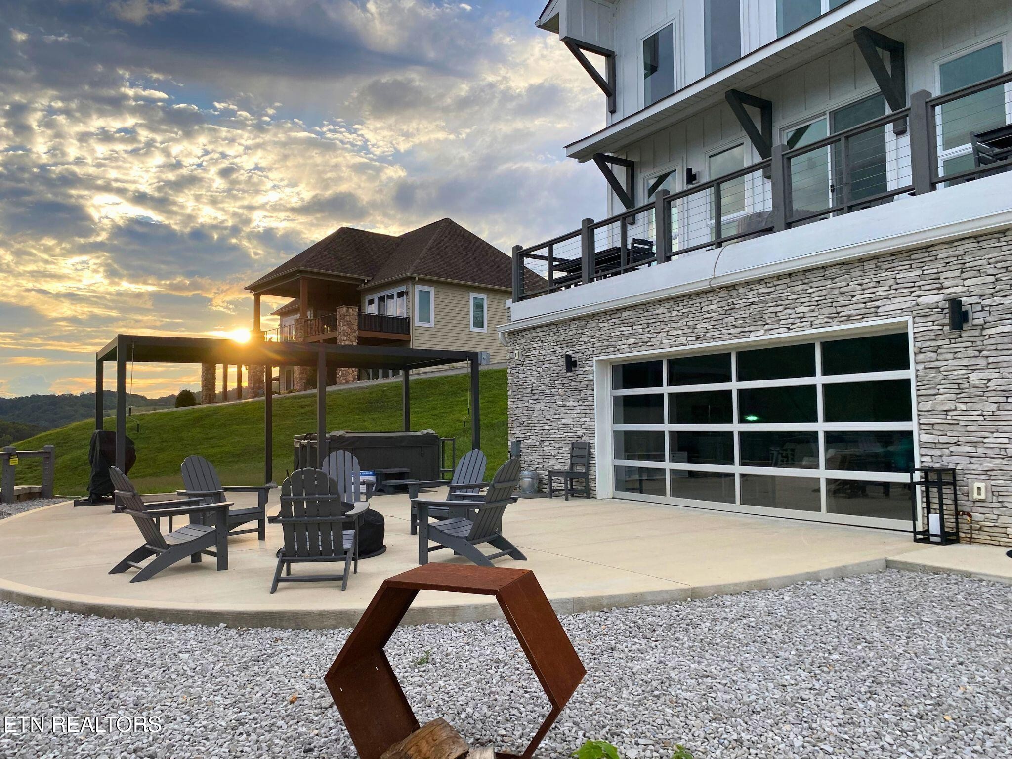 234 Cameron Loop Lane La Follette, TN 37766 - Photo 4 of 60 a view of a house with backyard porch and sitting area