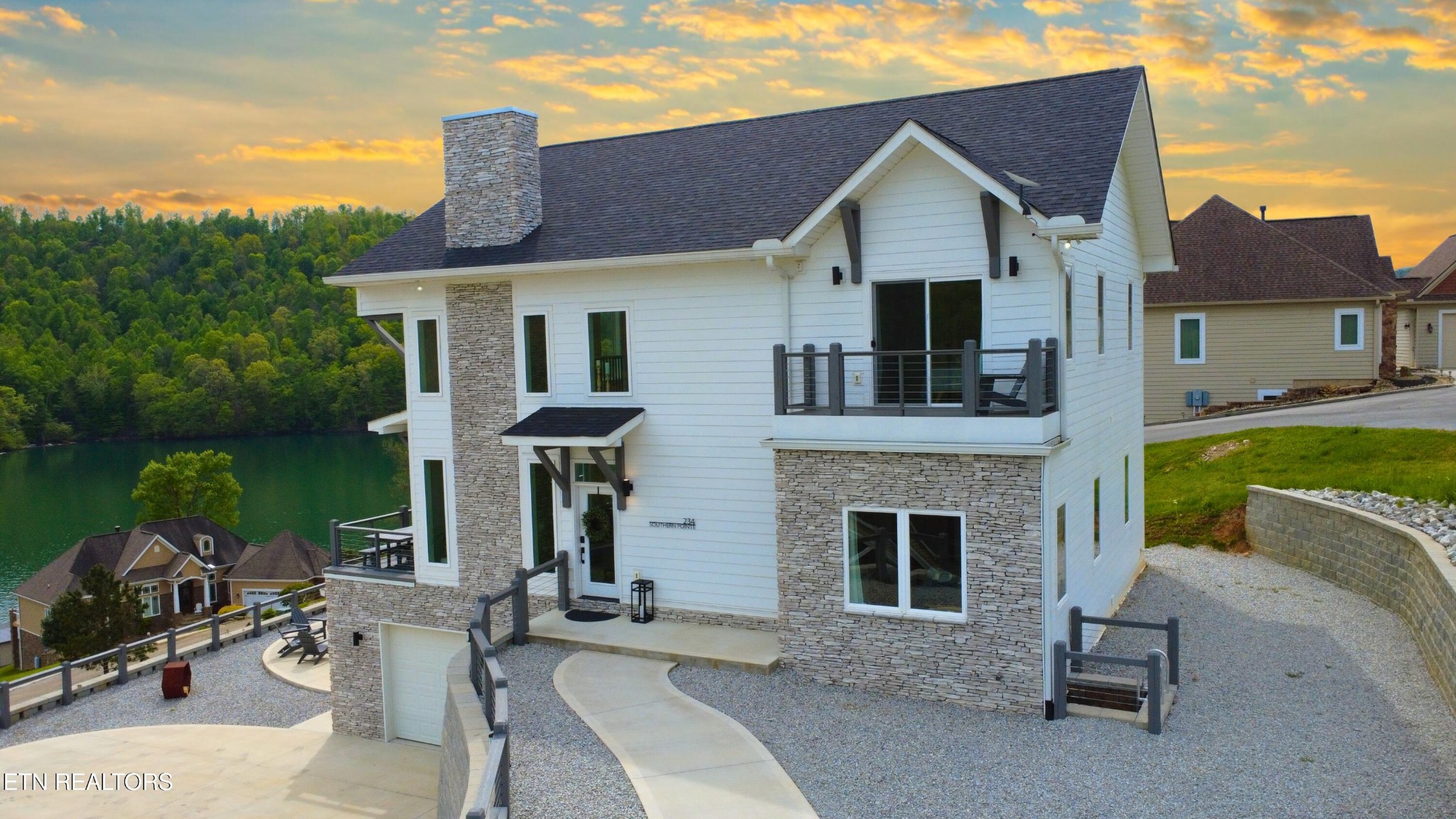 234 Cameron Loop Lane La Follette, TN 37766 - Photo 48 of 60 a front view of a house with garden