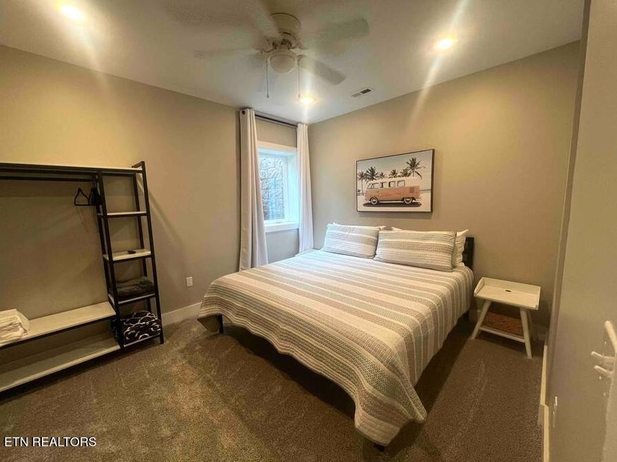 234 Cameron Loop Lane La Follette, TN 37766 - Photo 52 of 60 a bedroom with a bed and a window