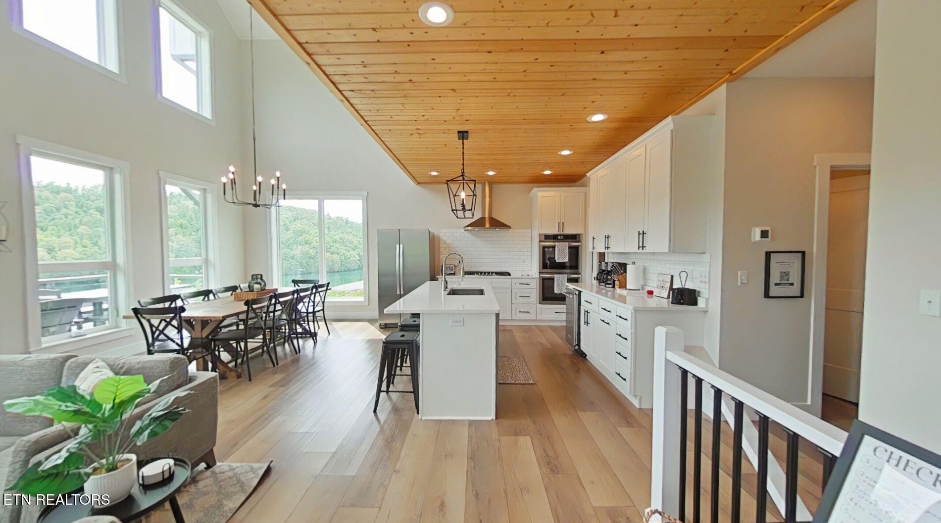 234 Cameron Loop Lane La Follette, TN 37766 - Photo 7 of 60 a view of a living room and dining room