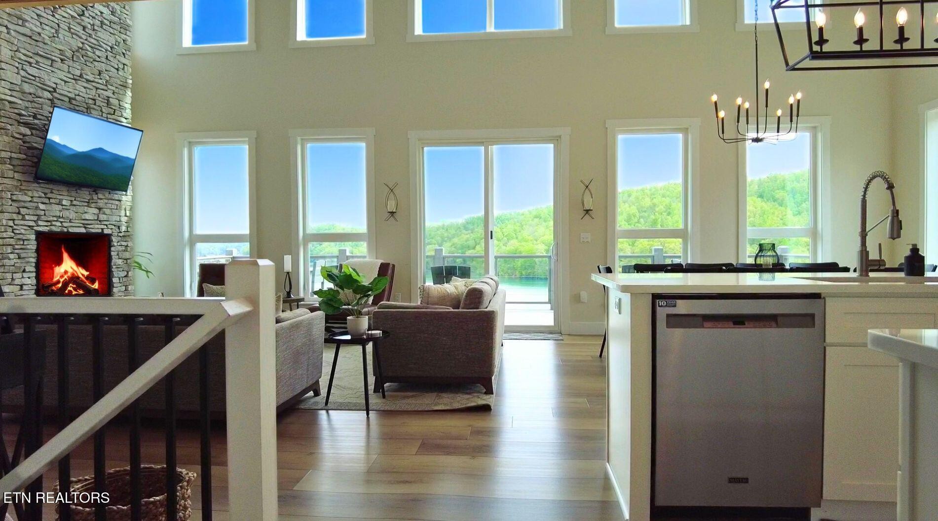 234 Cameron Loop Lane La Follette, TN 37766 - Photo 8 of 60 a living room with furniture fireplace and flat screen tv