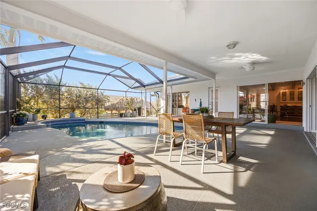 a view of a swimming pool with a patio
