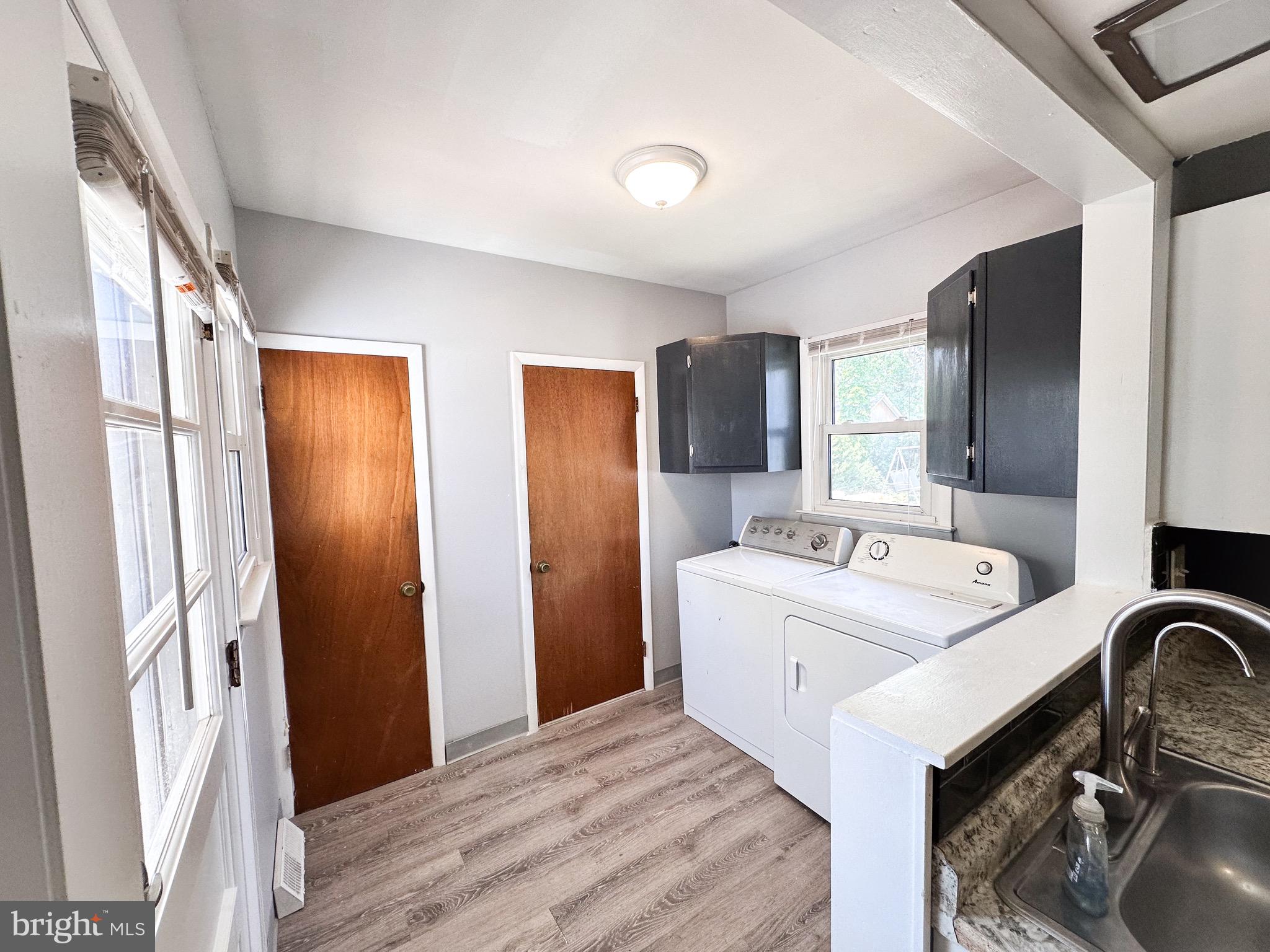 116 East Clinton Avenue Haddon Township, NJ 08107 - Photo 19 of 44 a bathroom with a sink a mirror and a bathtub