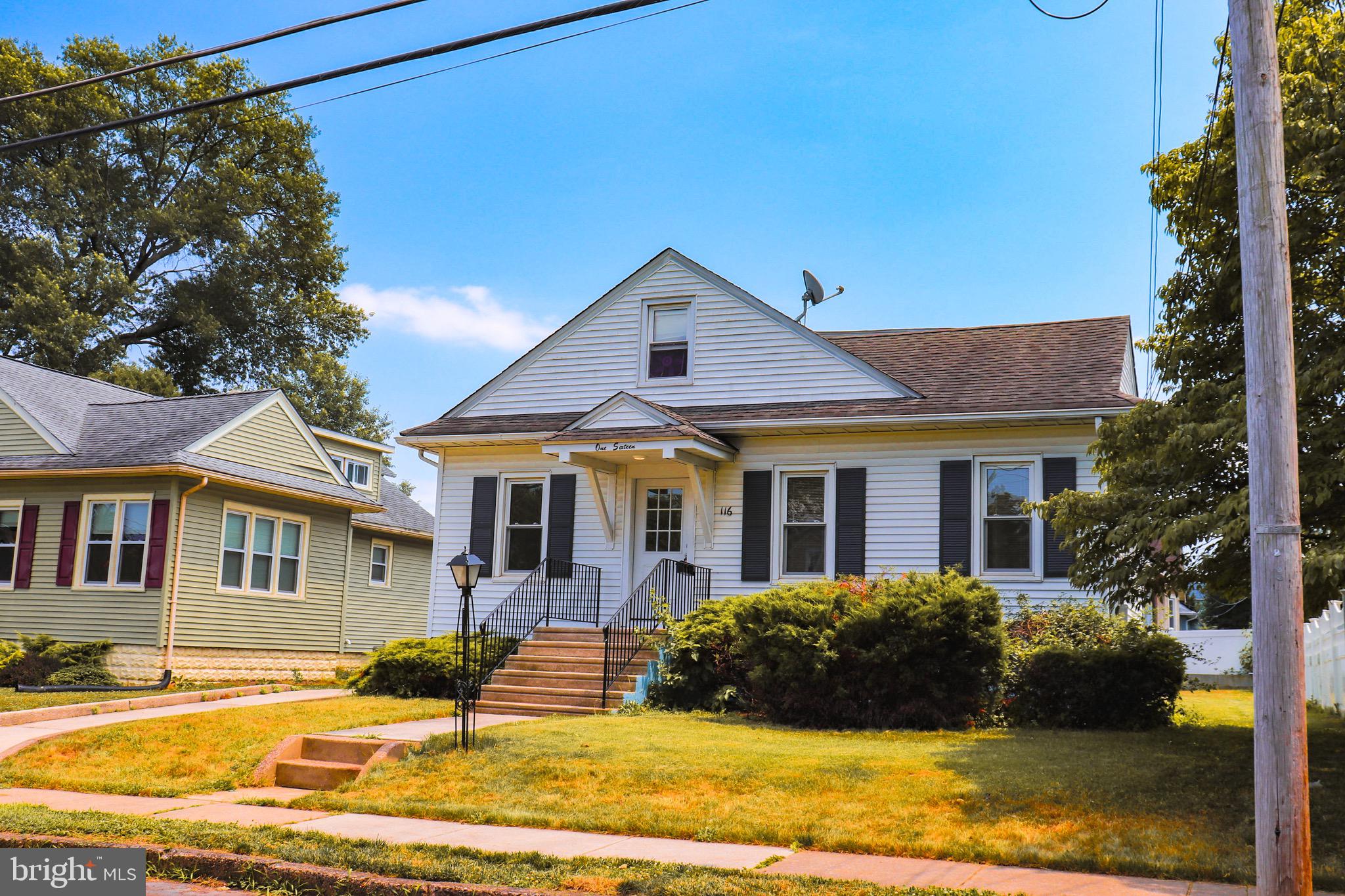116 East Clinton Avenue Haddon Township, NJ 08107 - Photo 34 of 44 a front view of a house with a yard