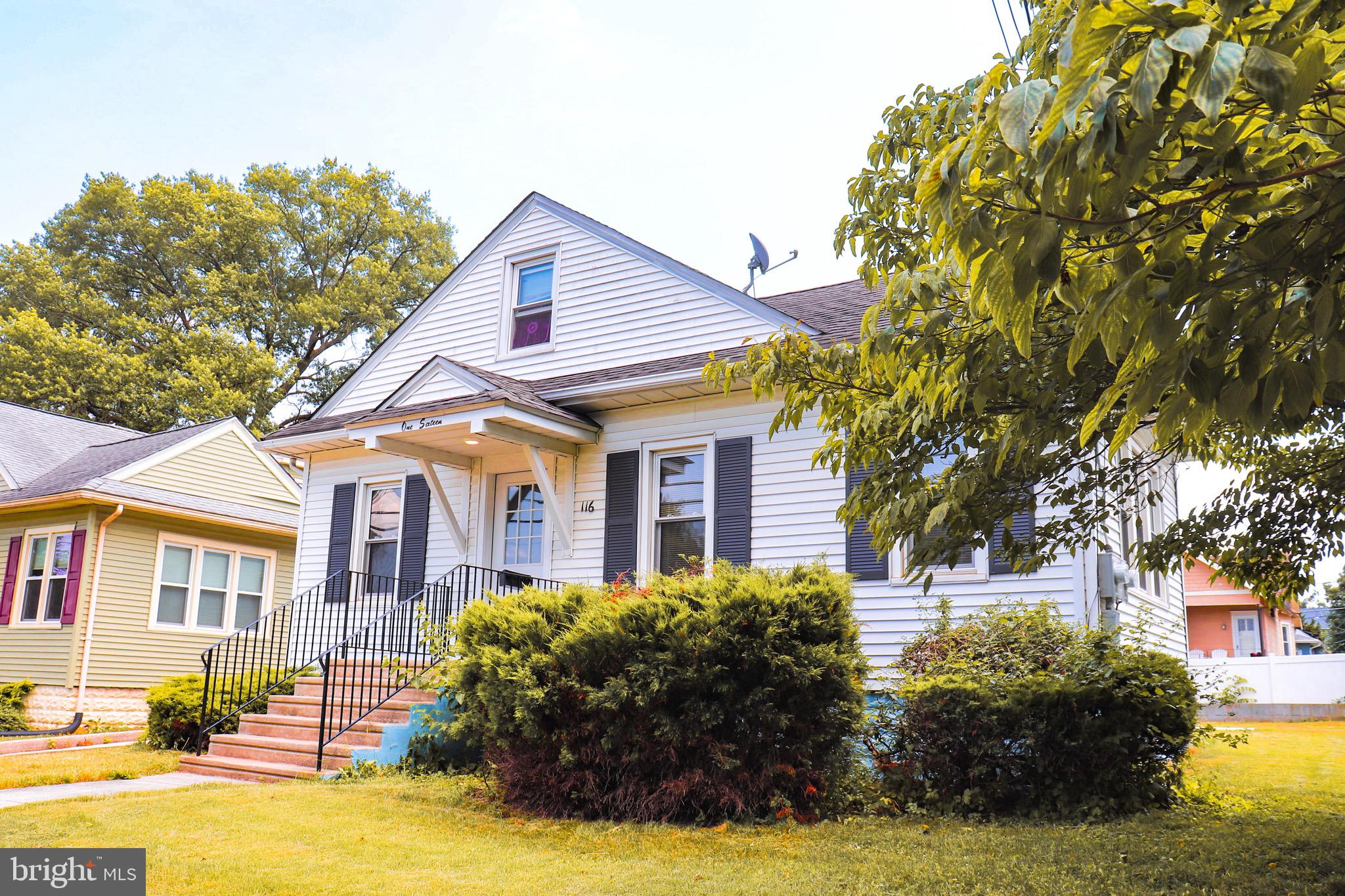 116 East Clinton Avenue Haddon Township, NJ 08107 - Photo 35 of 44 a front view of a house with garden
