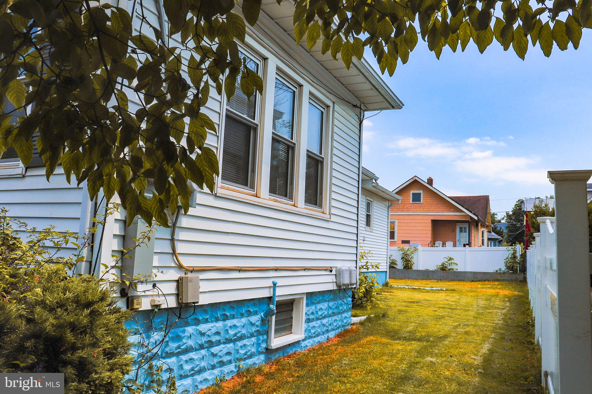 116 East Clinton Avenue Haddon Township, NJ 08107 - Photo 36 of 44 a view of a house with pool and wooden fence