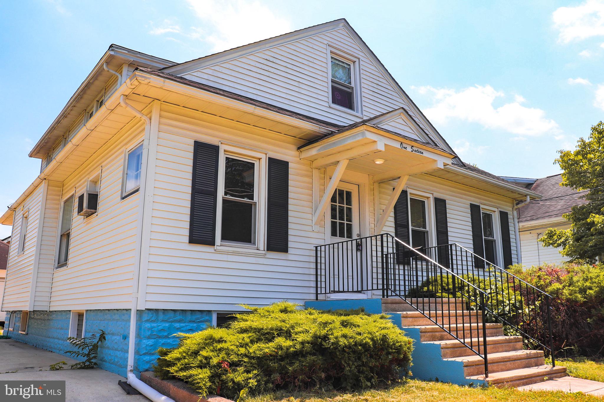 116 East Clinton Avenue Haddon Township, NJ 08107 - Photo 41 of 44 a front view of a house with a yard