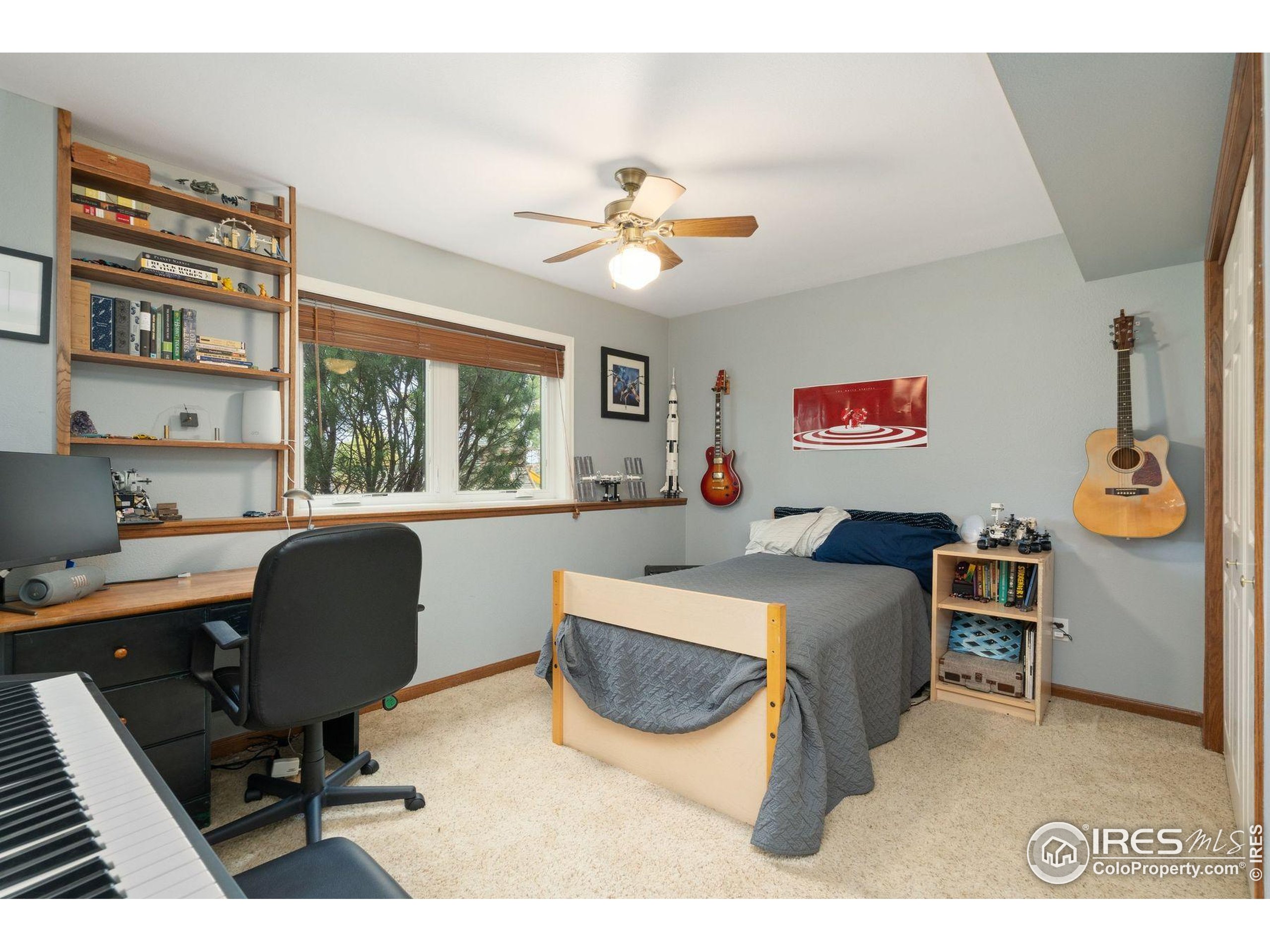 1055 Coho Run Fort Collins, CO 80524 - Photo 24 of 50 a workspace with furniture hardwood and a window