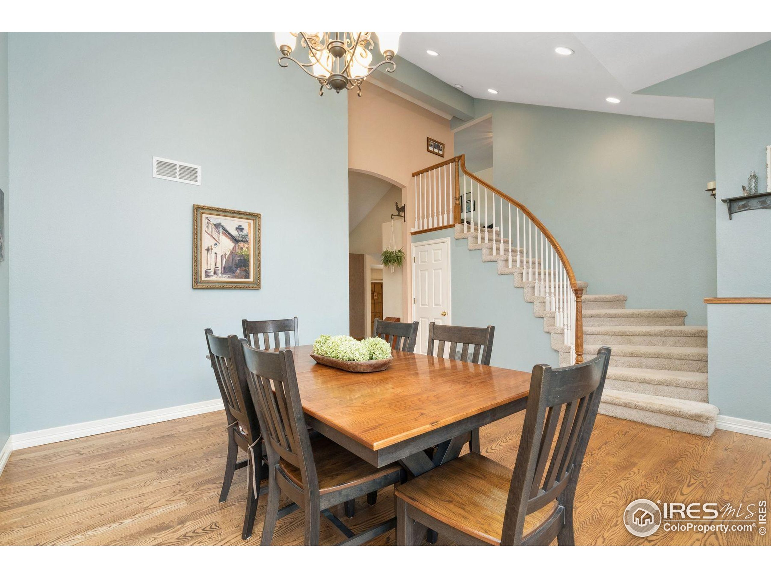 1055 Coho Run Fort Collins, CO 80524 - Photo 3 of 50 a view of a dining room with furniture