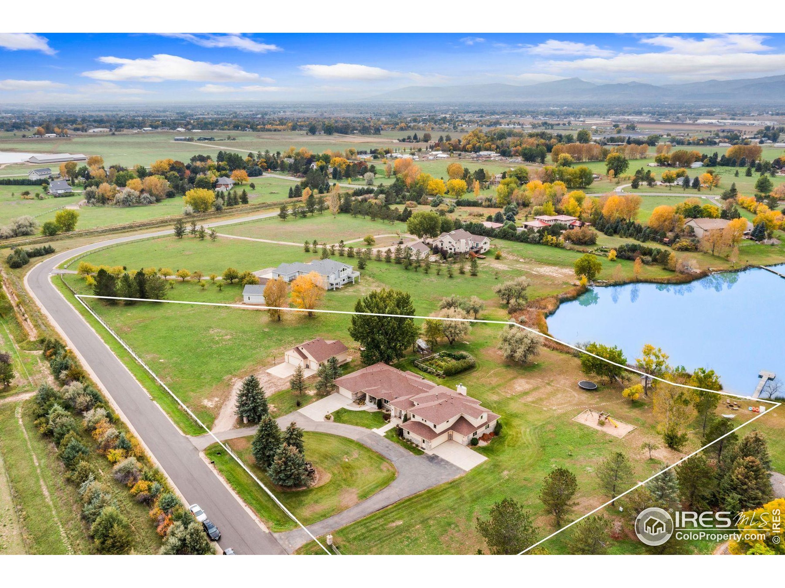 1055 Coho Run Fort Collins, CO 80524 - Photo 49 of 50 an aerial view of residential houses with outdoor space