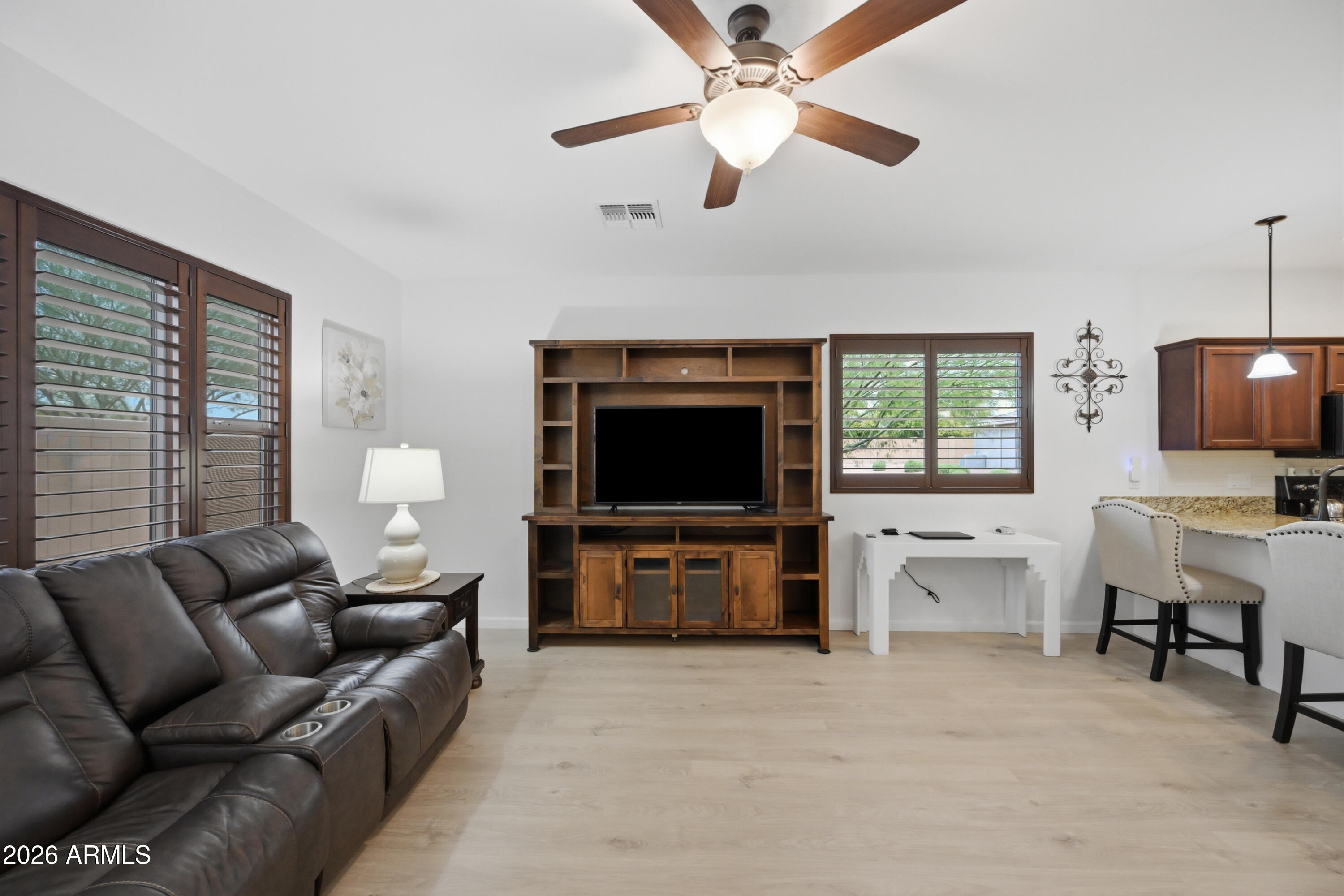 3117 South Signal Butte Road, Unit 476 Mesa, AZ 85212 - Photo 18 of 31 SC476 Great Room from Patio